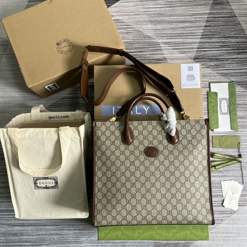 G*u*i shopping bags